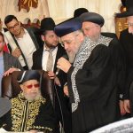 Coronation of Rabbi Yitzchak Yosef as Sephardi Chief Rabbi of Israel. Seen in picture: President Shimon Peres (far left), Rabbi Ovadia Yosef (seated), Rabbi Yitzchak Yosef (speaking into microphone), Rabbi Shalom Cohen (far right).